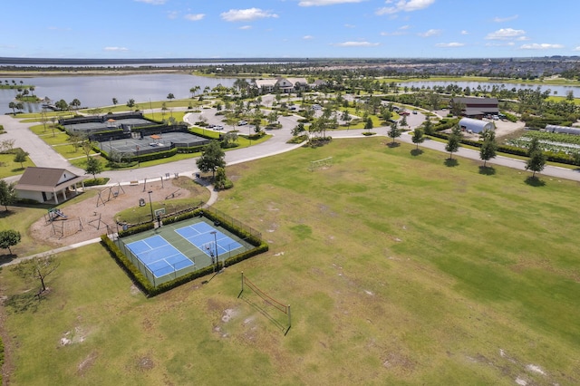 birds eye view of property featuring a water view