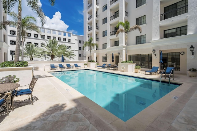 pool with a patio