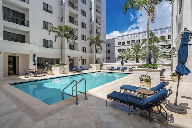 community pool with a patio