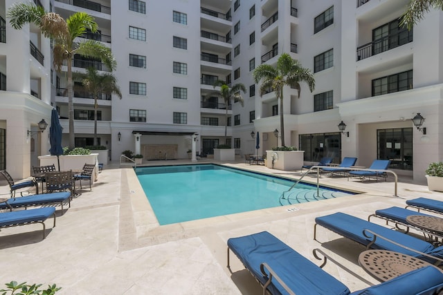 pool with a patio area