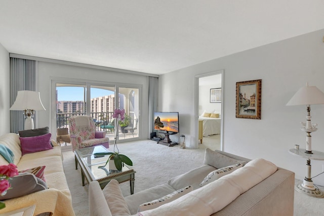 living room featuring light carpet