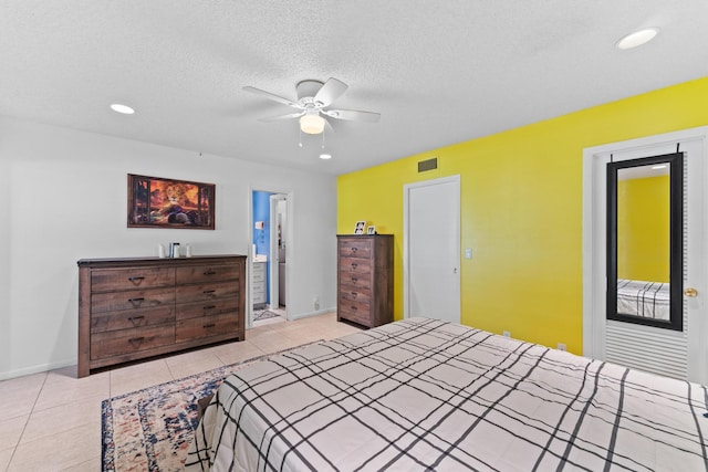 201 Country Ln Unit B, Boynton Beach, FL 33435 - bedroom with light tile patterned floors, recessed lighting, baseboards, a textured ceiling, and ceiling fan