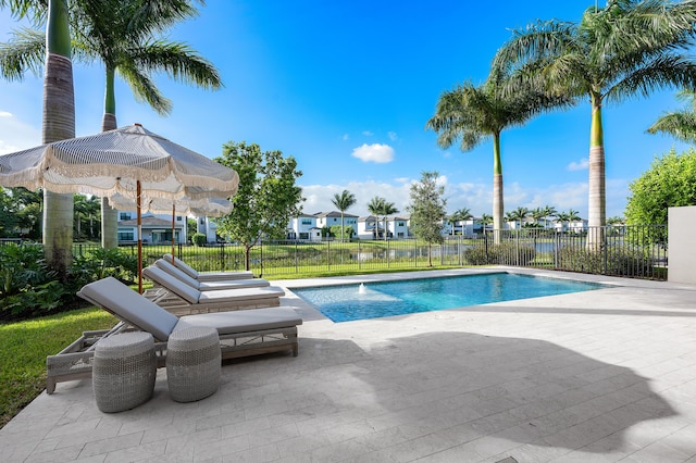 view of pool featuring a patio and pool water feature