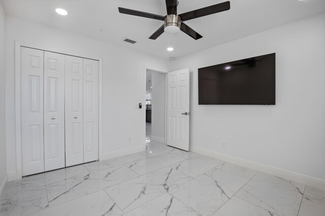 unfurnished bedroom featuring recessed lighting, visible vents, baseboards, marble finish floor, and a closet