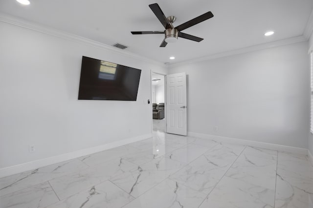 empty room with marble finish floor, crown molding, recessed lighting, visible vents, and baseboards