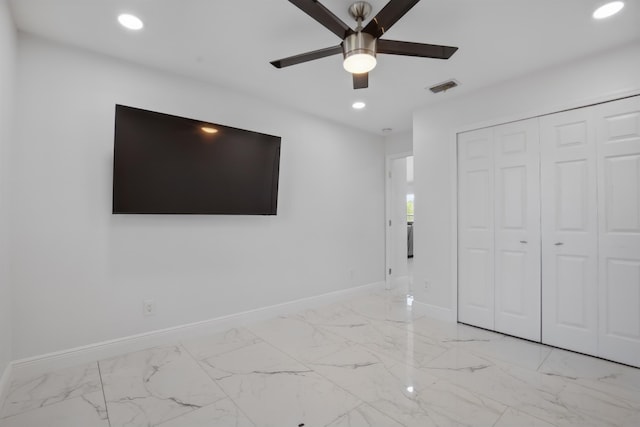 unfurnished bedroom featuring recessed lighting, marble finish floor, visible vents, and baseboards