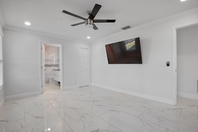 interior space featuring marble finish floor, ornamental molding, visible vents, and baseboards