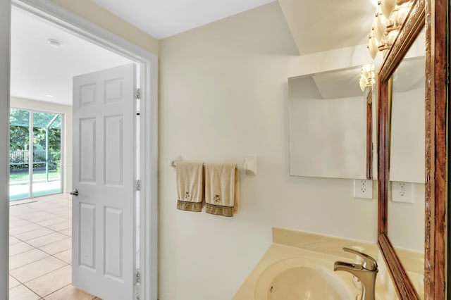 bathroom with tile patterned floors and vanity