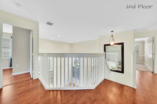 corridor featuring hardwood / wood-style flooring