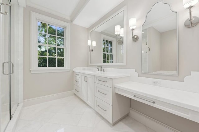 bathroom with vanity and an enclosed shower