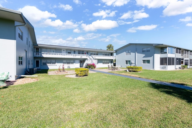 view of yard with central AC