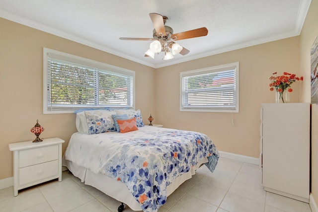 bedroom featuring light tile patterned floors, ceiling fan, and crown molding