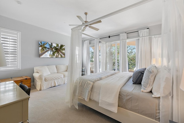 carpeted bedroom featuring access to outside, ceiling fan, and crown molding