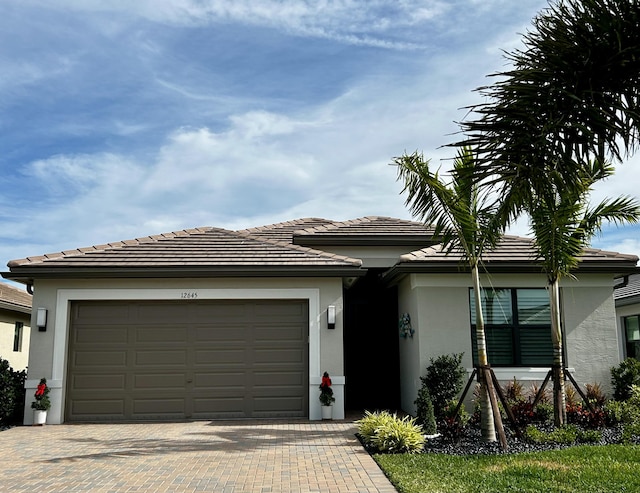 view of front of home with a garage