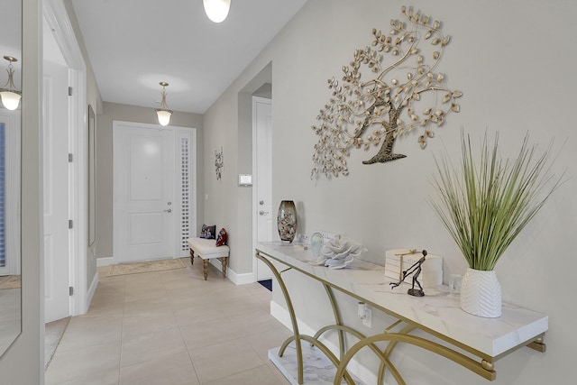 entryway featuring light tile patterned flooring