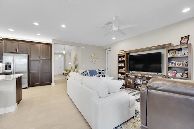 living room featuring ceiling fan