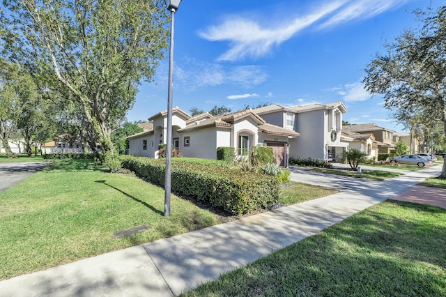 view of front of home featuring a front yard