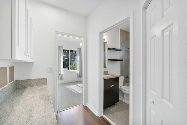 interior space with dark colored carpet