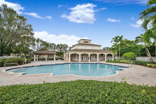 view of swimming pool featuring a gazebo and a patio