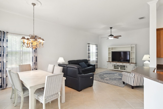 dining room with ceiling fan with notable chandelier and light tile patterned flooring