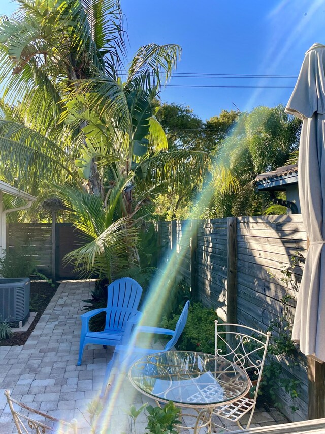 view of patio featuring central AC unit