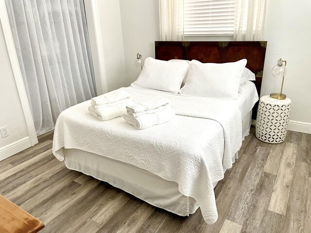 bedroom featuring light wood-type flooring