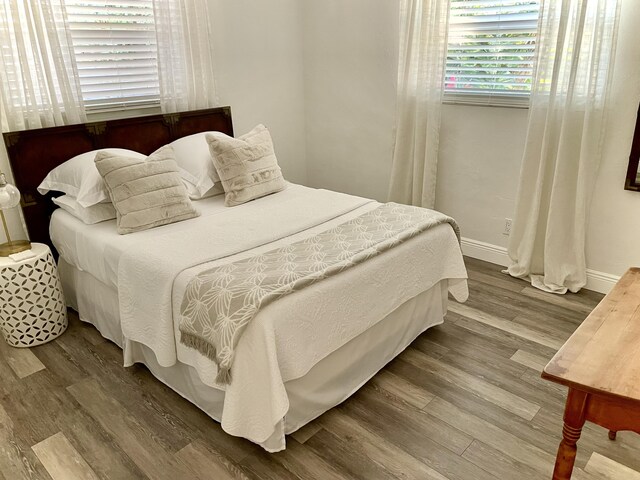 bedroom featuring hardwood / wood-style flooring