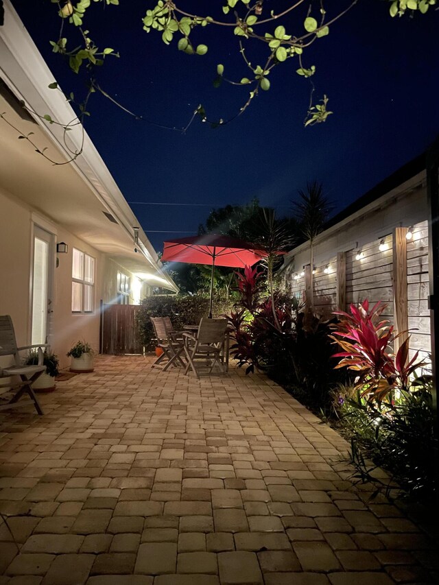 view of patio at night