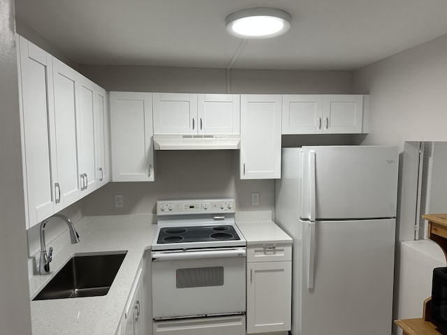 kitchen featuring white cabinets, white appliances, and sink