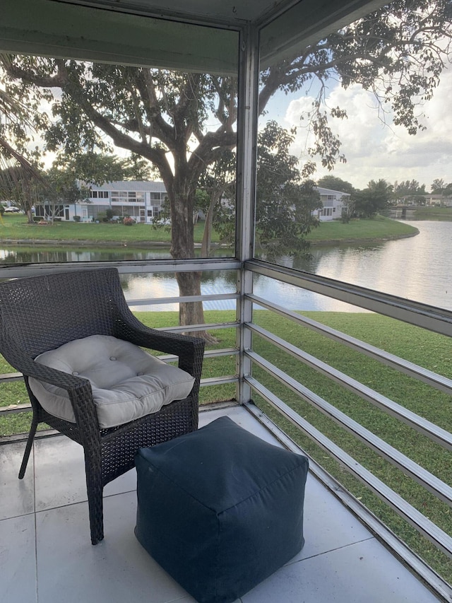 sunroom with a water view