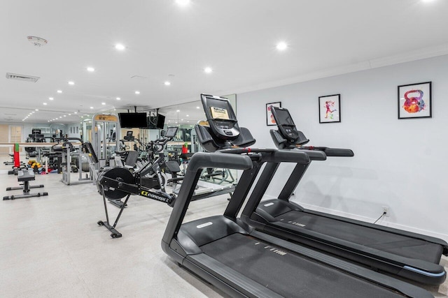 workout area with ornamental molding