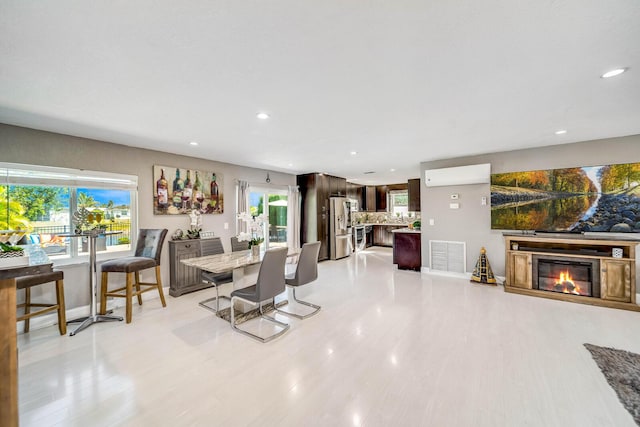 dining room with a healthy amount of sunlight