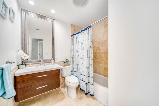 full bathroom featuring shower / bath combo with shower curtain, toilet, tile patterned flooring, and vanity