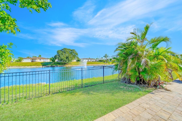 view of yard with a water view