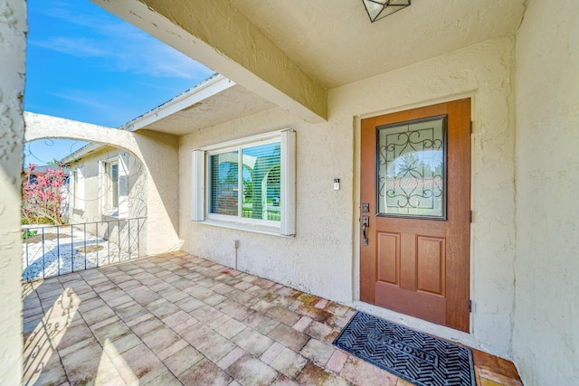 entrance to property with covered porch