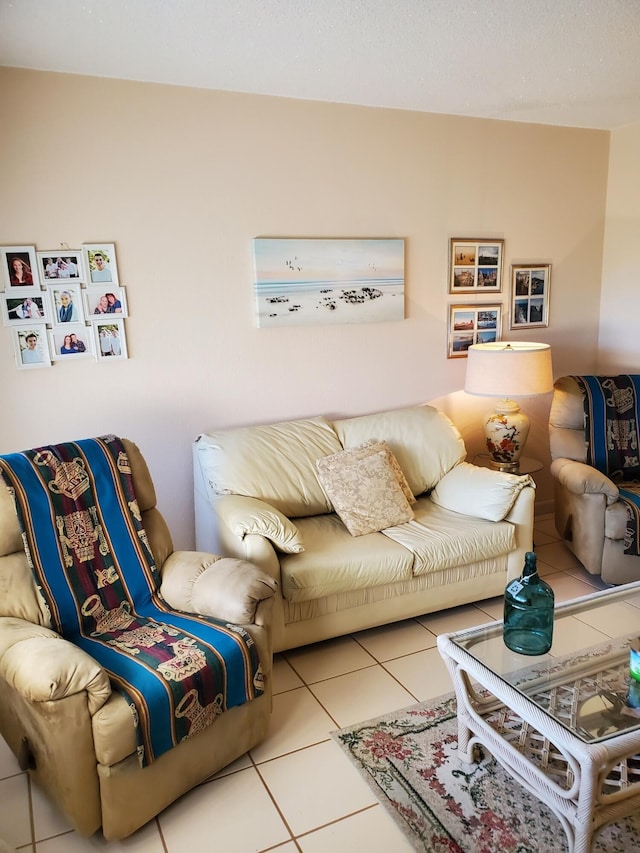 living room with tile patterned flooring