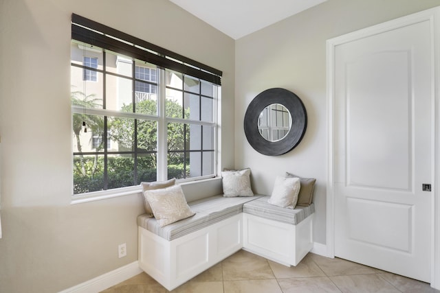 living area featuring light tile patterned floors