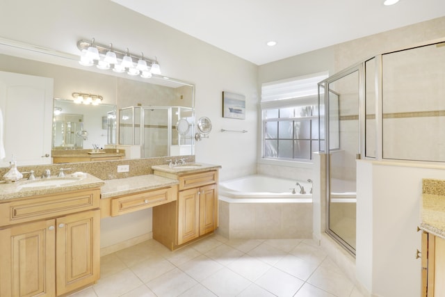 bathroom with vanity, tile patterned floors, and independent shower and bath