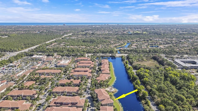 aerial view featuring a water view