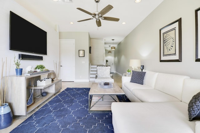 living room featuring ceiling fan