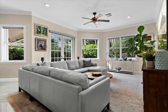 living room with ceiling fan, light tile patterned flooring, crown molding, and french doors