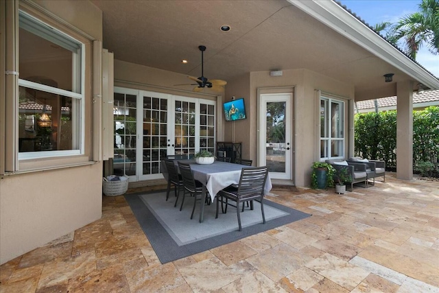 view of patio / terrace with ceiling fan and french doors