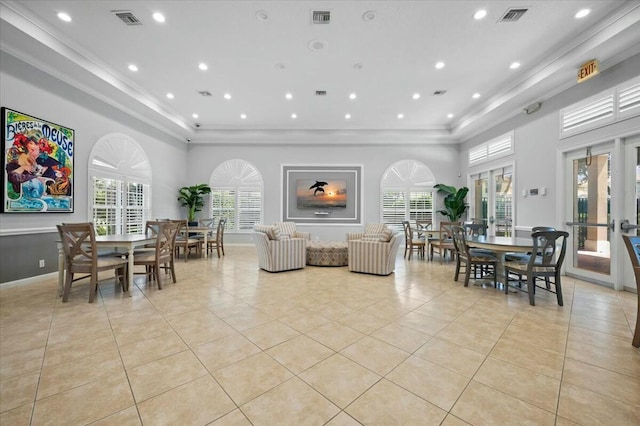 interior space with french doors, a high ceiling, and plenty of natural light