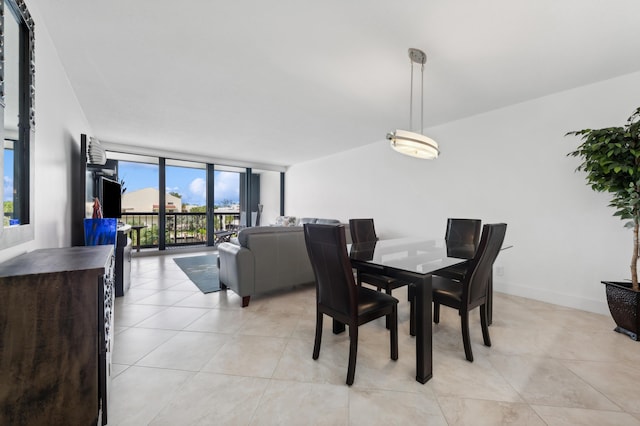 dining room featuring expansive windows