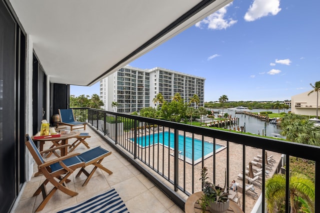 balcony featuring a water view