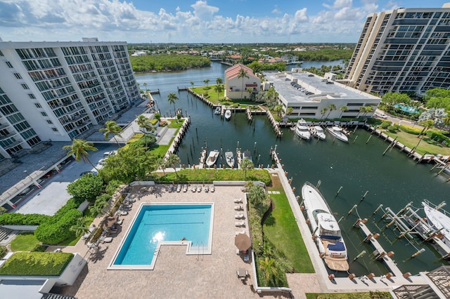 birds eye view of property with a water view