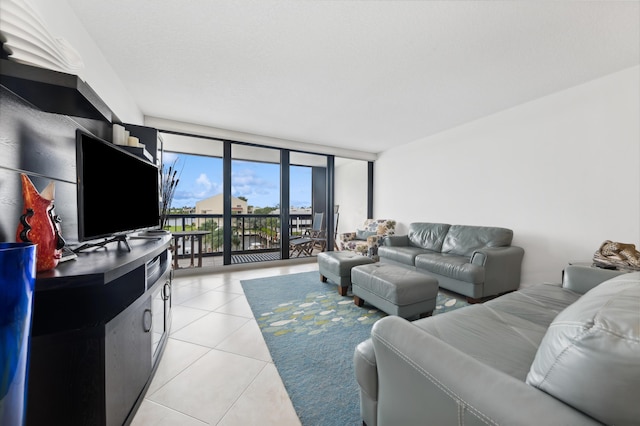 tiled living room with floor to ceiling windows