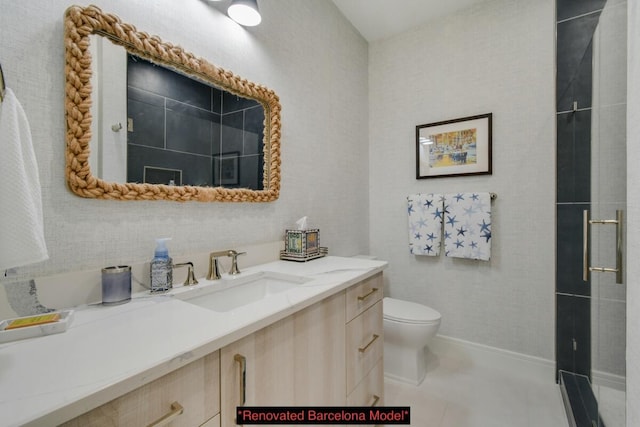 bathroom with vanity, toilet, and tile patterned floors