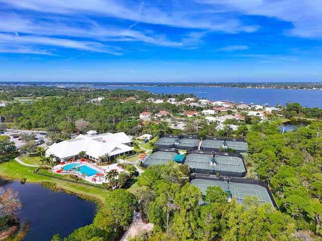 birds eye view of property with a water view