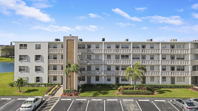 view of building exterior featuring a water view